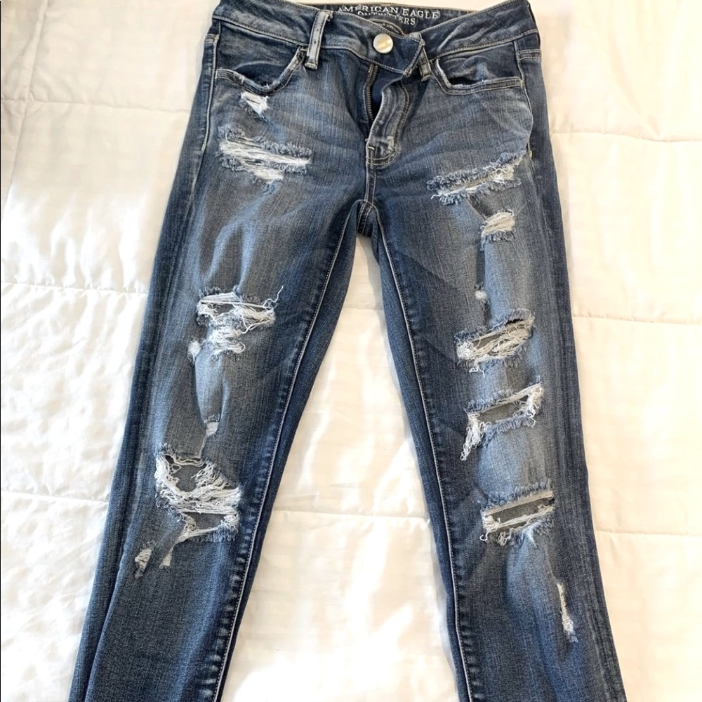 Dark blue denim jeans , From American Eagle . Size / small & stretch